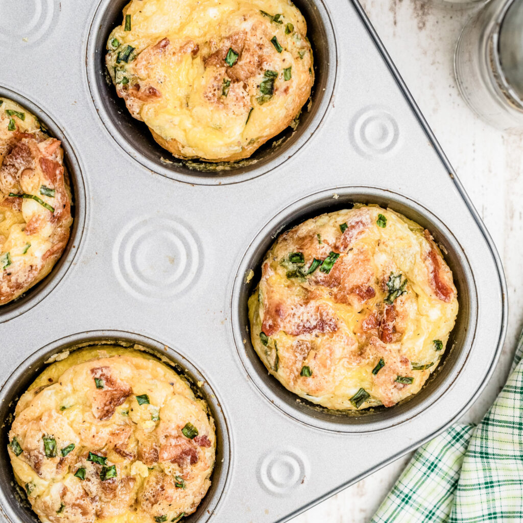 Breakfast muffins baked in a tin, cooling