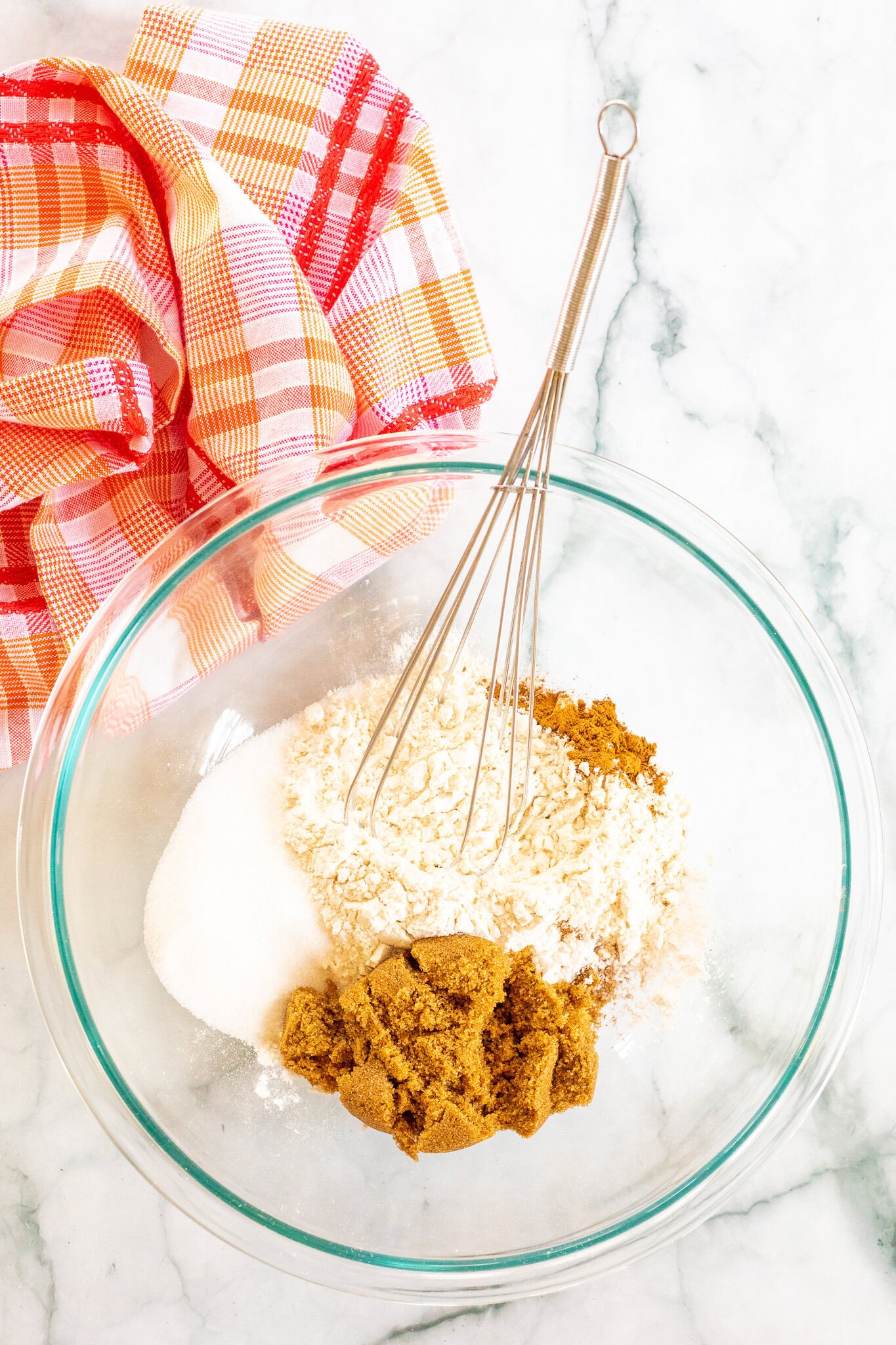 Brown sugar, white sugar, flour in a mixing bowl