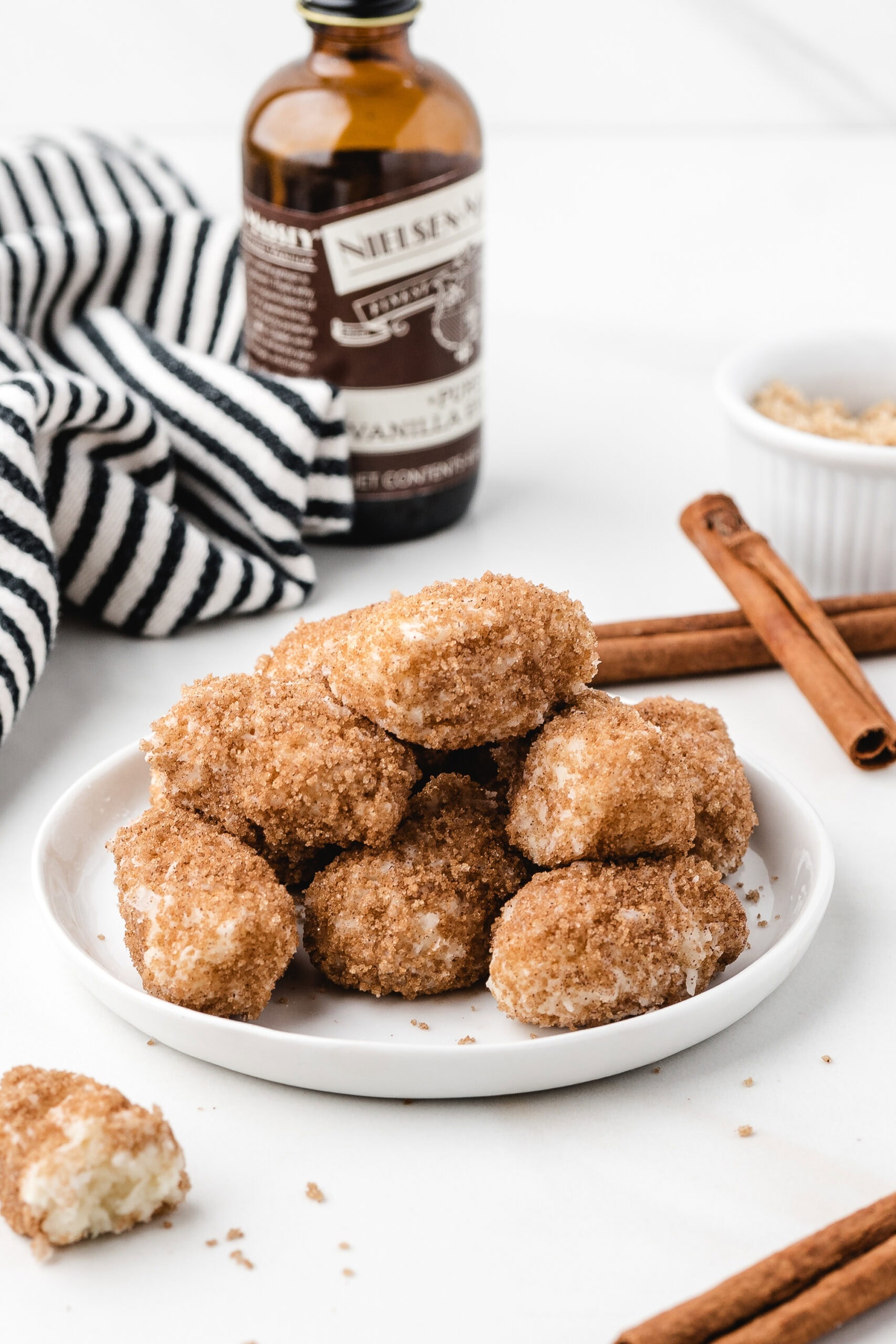 Stack of Irish potato candy on a white plate