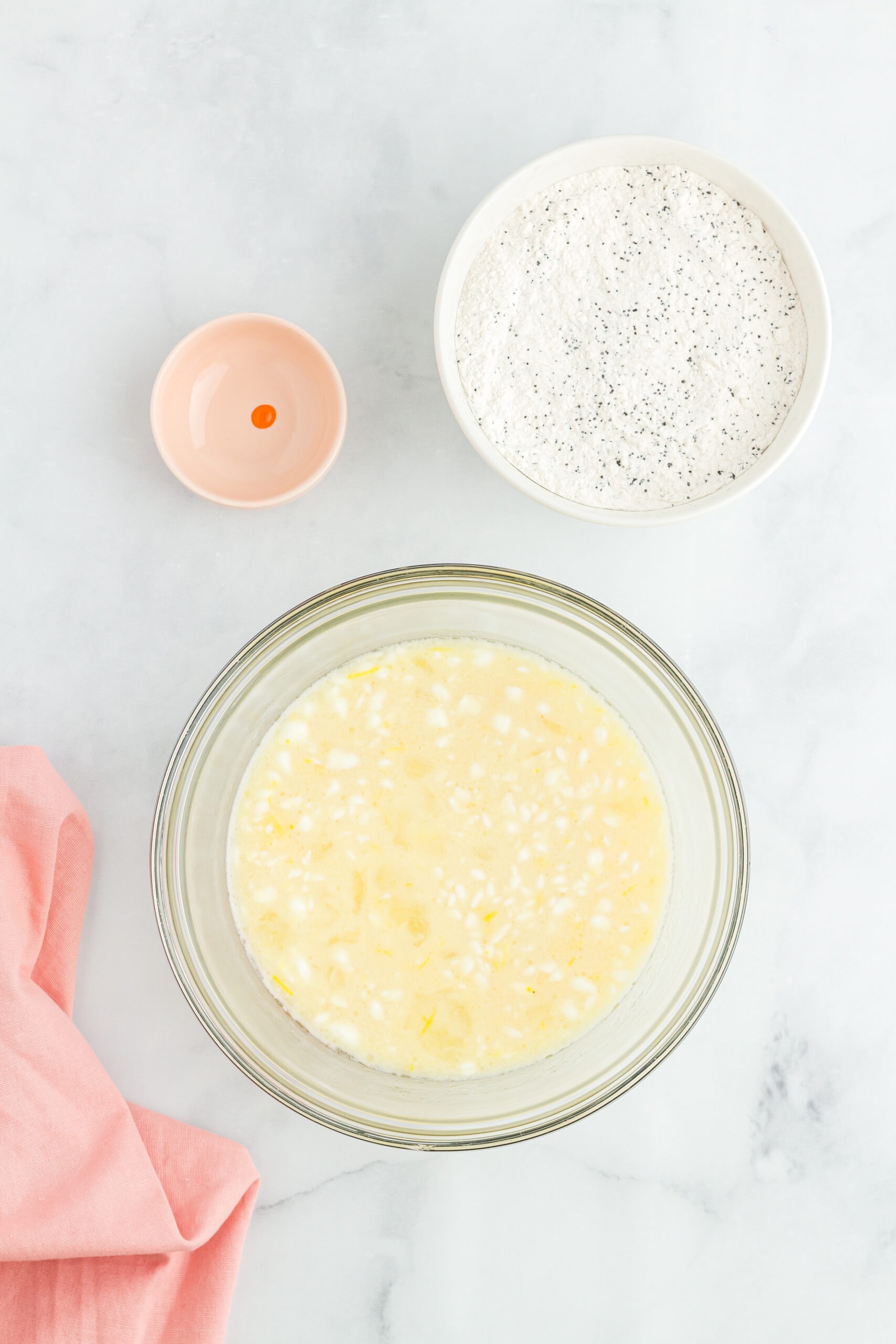 White sugar, sour cream, vegetable oil, lemon juice and lemon zest in a mixing bowl