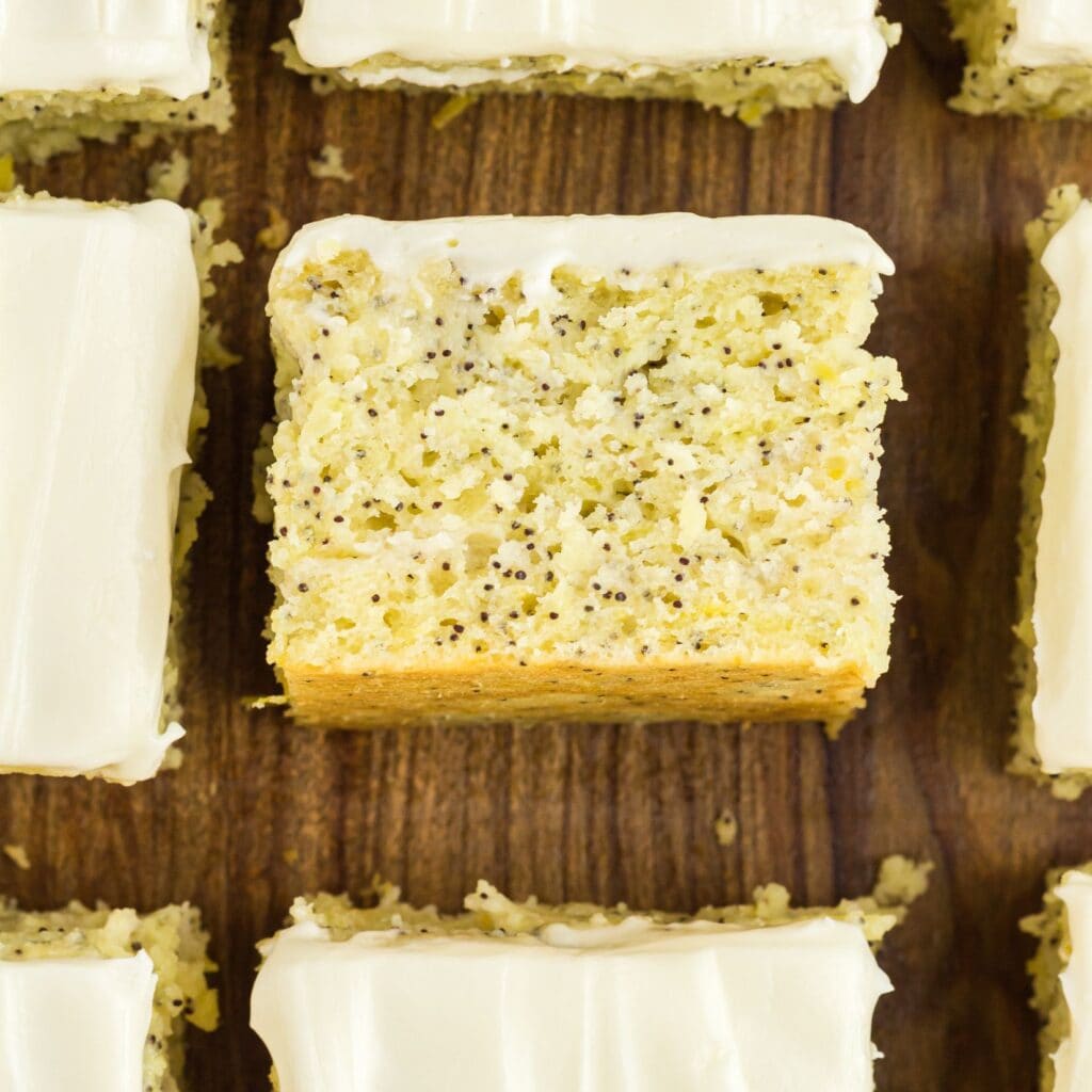 a square piece placed upward to see the texture of the lemon poppy seed cake