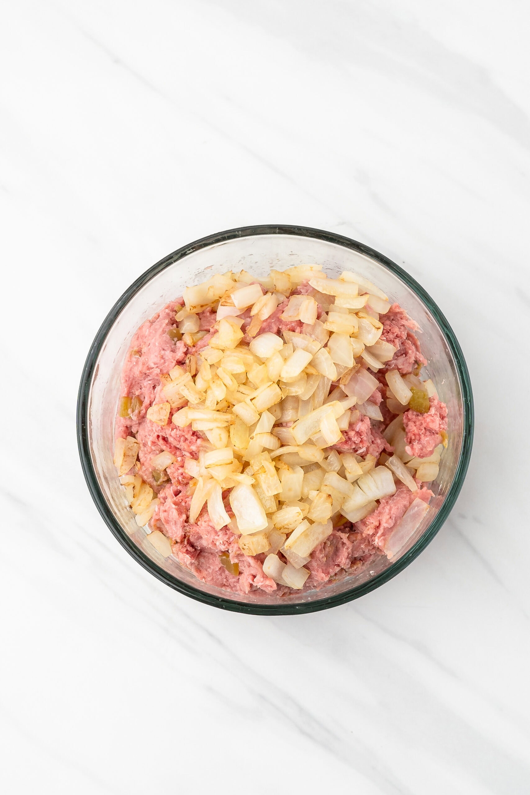 Diced sauteed onions added to ground beef and ground turkey