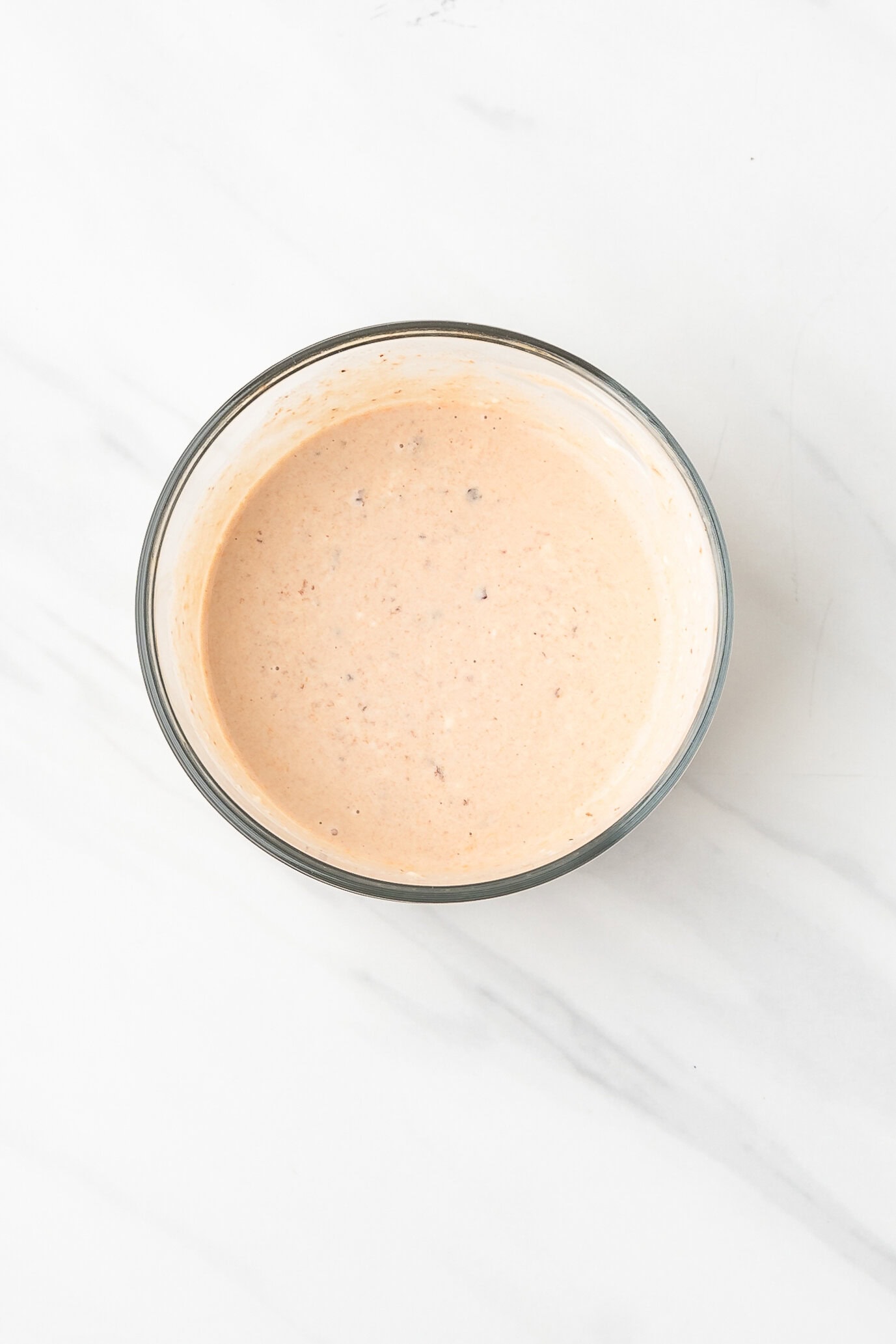 Mayo mixed with chipotles in adobe sauce, and lime juice in a bowl