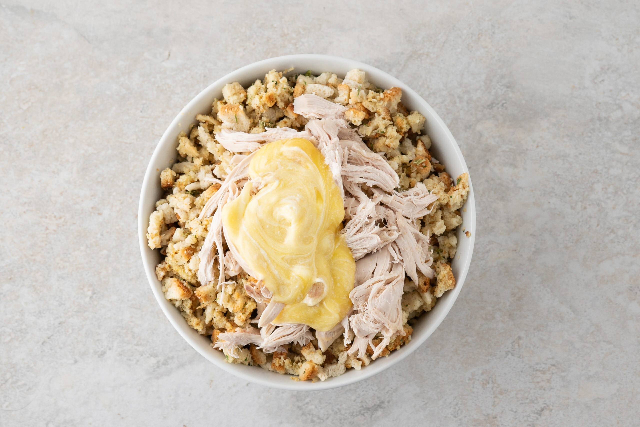 Stove top stuffing, rotisserie chicken and can of cream of chicken soup on top.