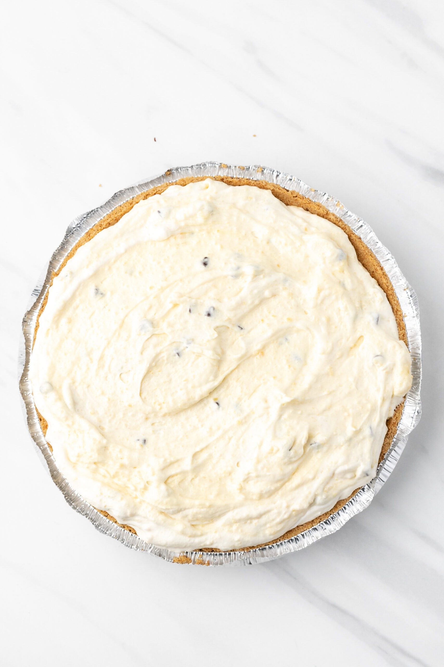 Pudding mixture on top of graham cracker crust