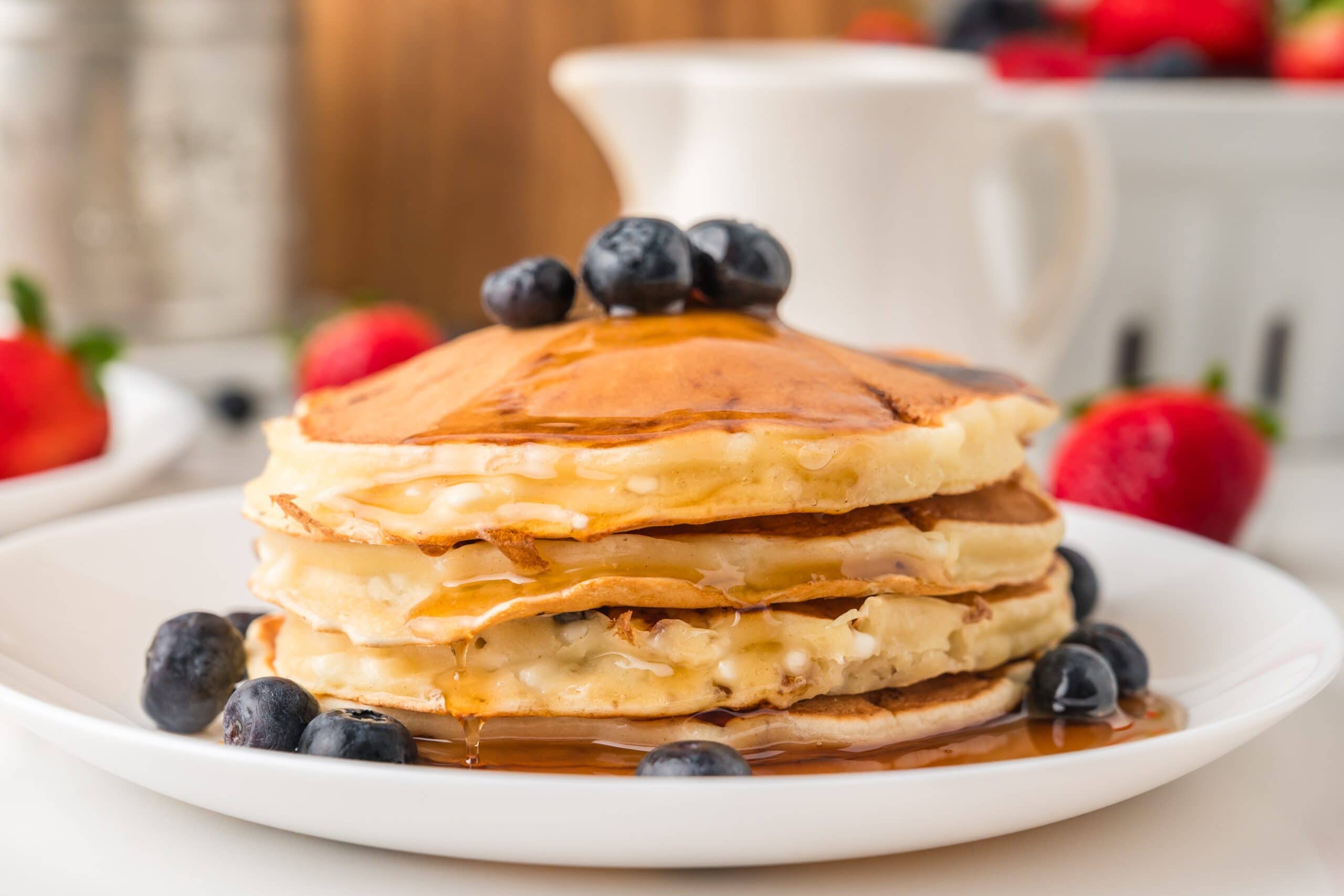 Cottage cheese pancakes on white plate