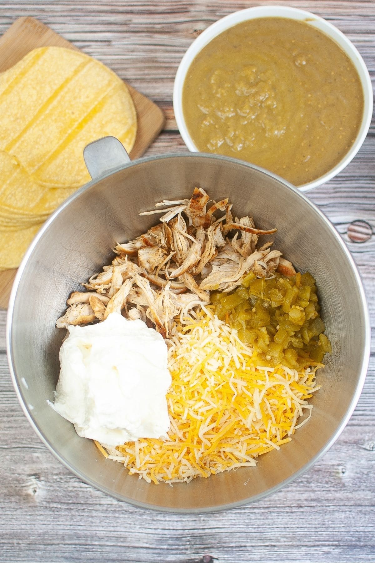 Chicken enchilada filling mixed in a bowl