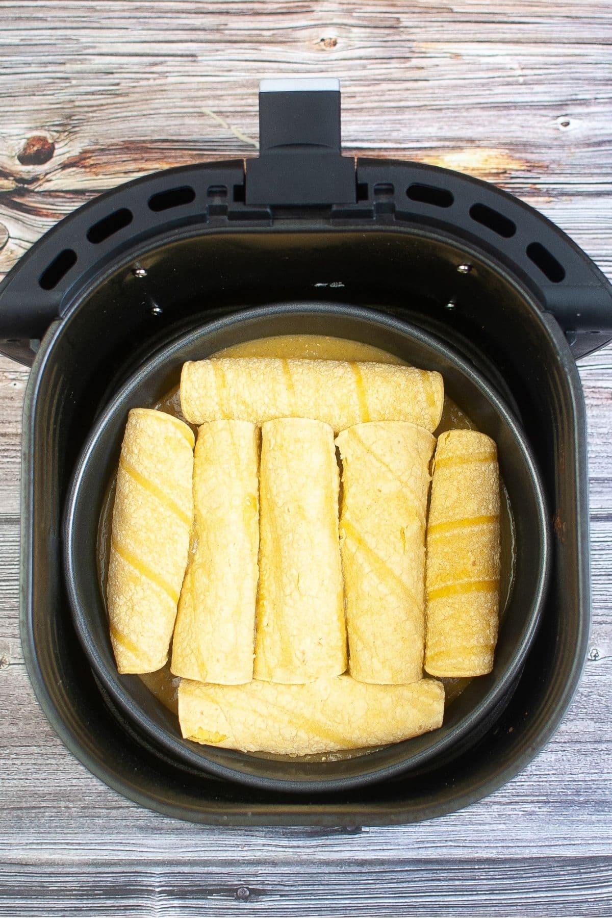 Green chili chicken enchiladas rolled