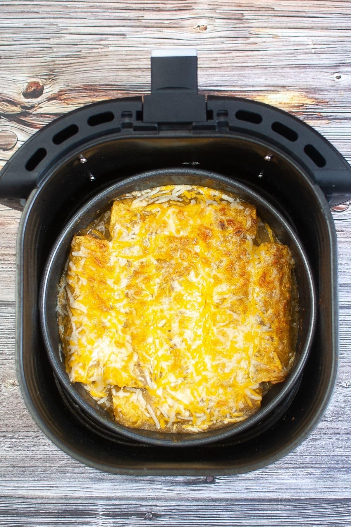 Green chili enchiladas inside the air fryer