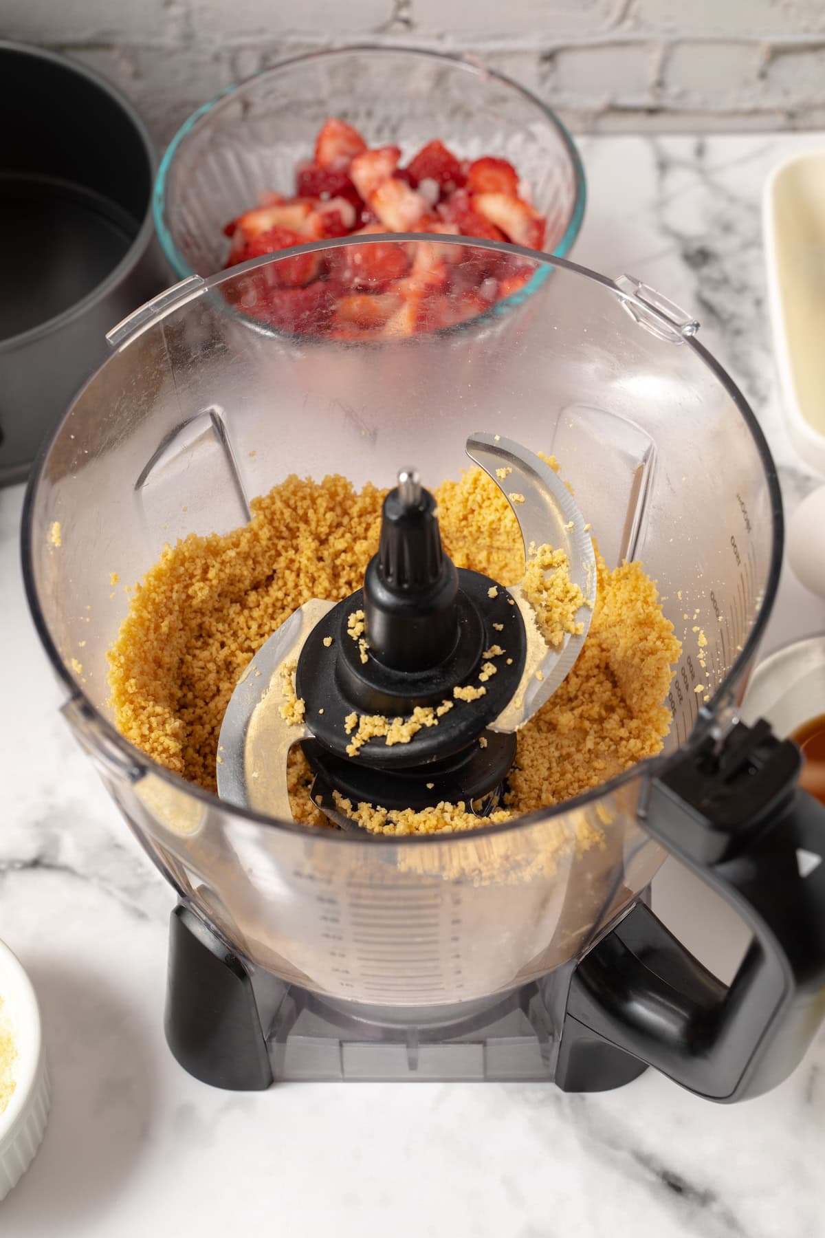 Lemon Oreo crumbs in the food processor