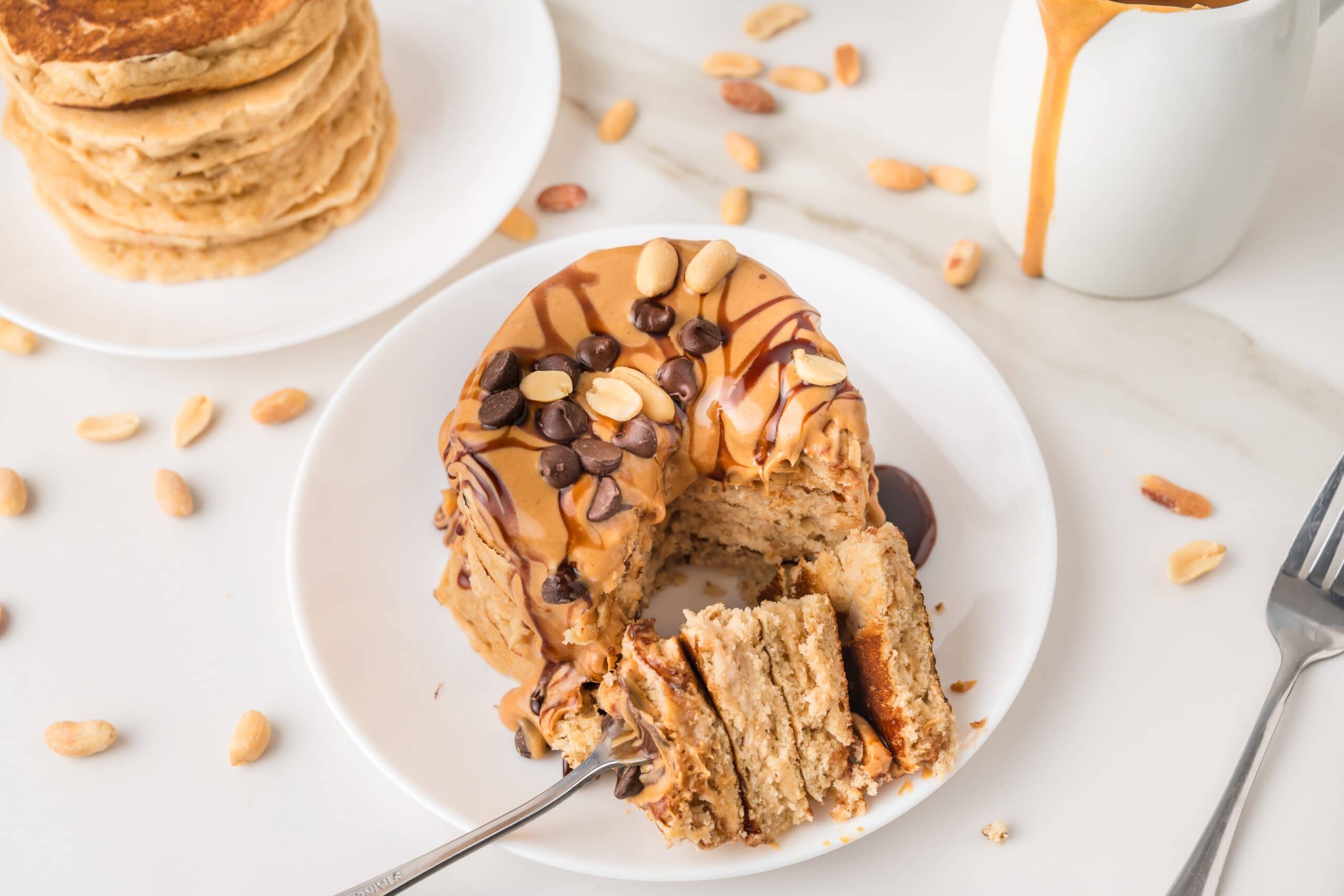 Peanut butter pancakes on white plate