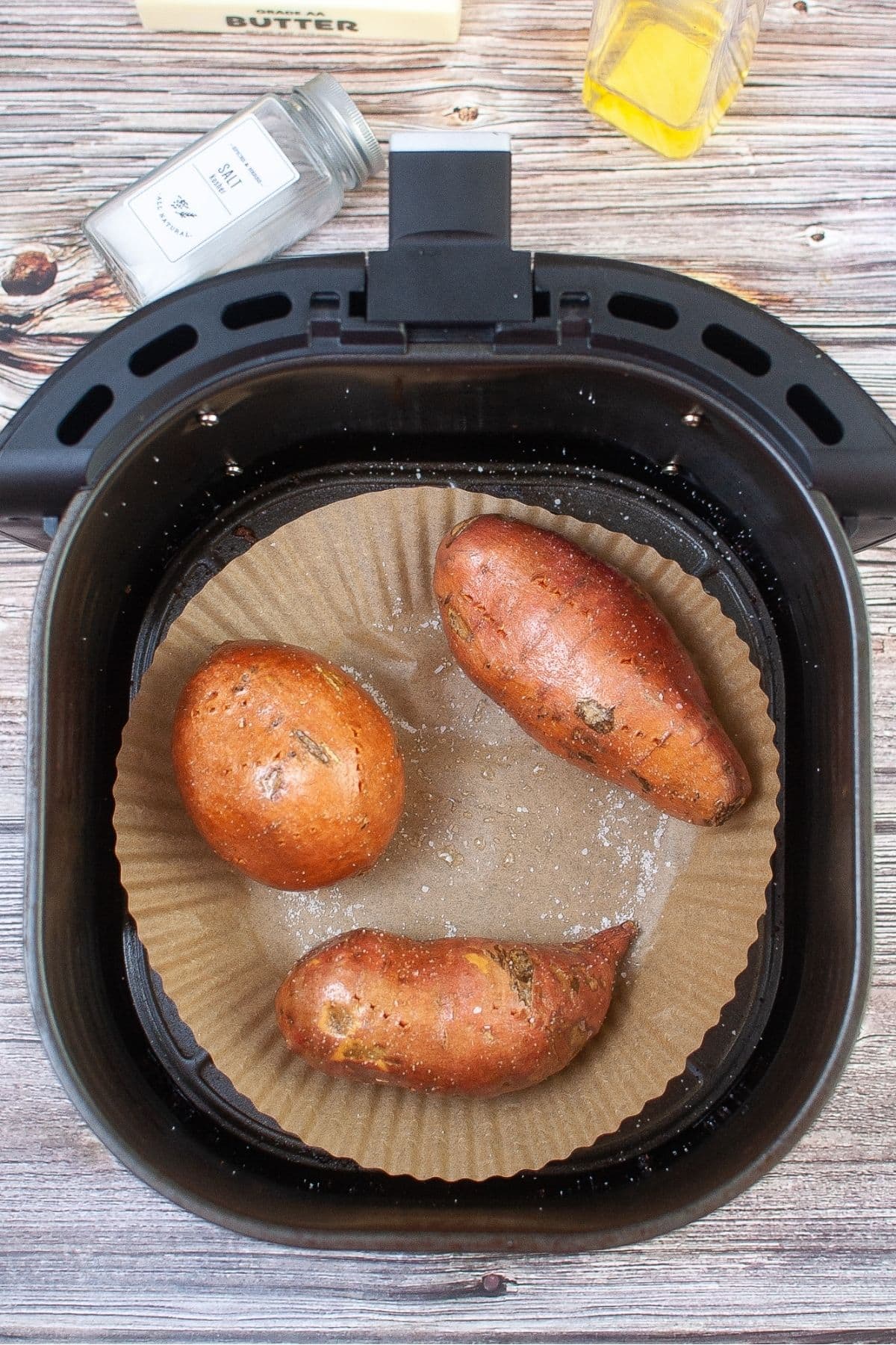 Sweet potatoes cooking in air fryer