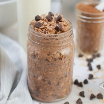 a closeup of double chocolate overnight oats topped with chocolate chips