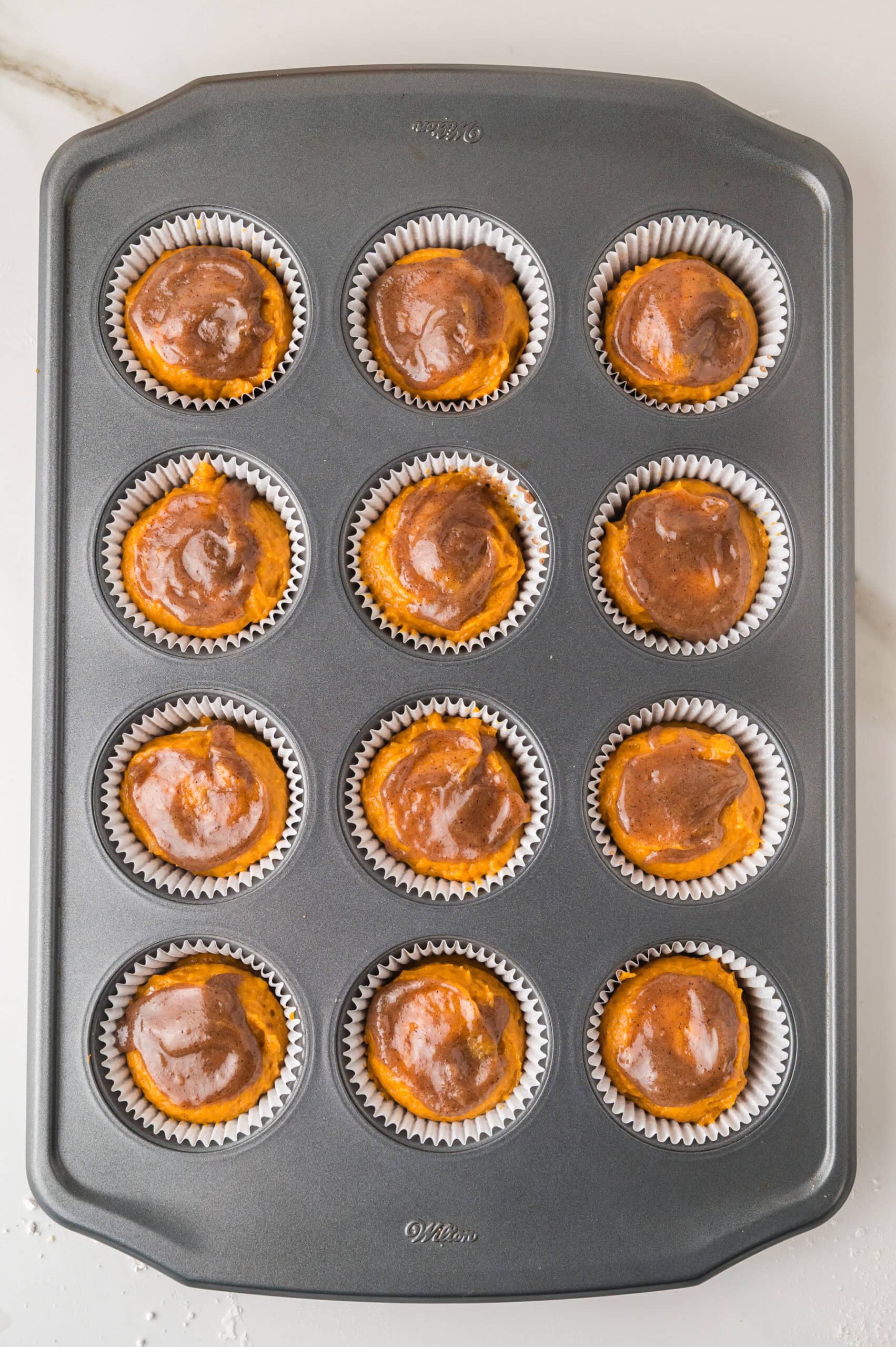 Pumpkin cream cheese muffins with spiced topping