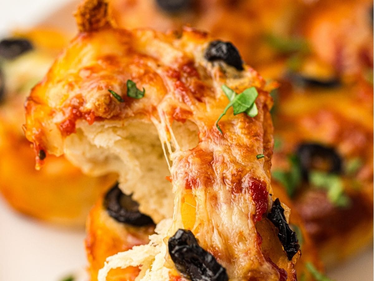 Baked pizza muffins with black olives