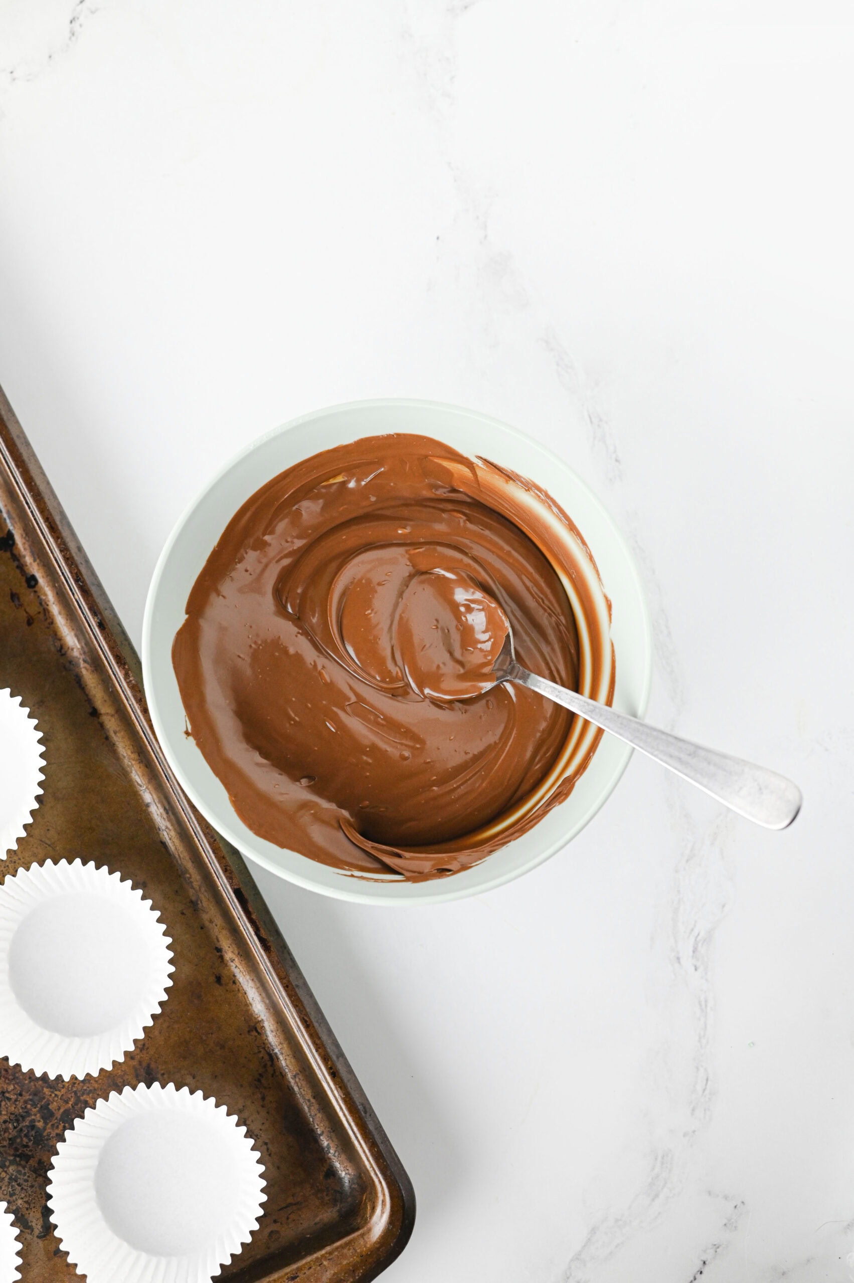 Melted chocolate for peppermint bark cups