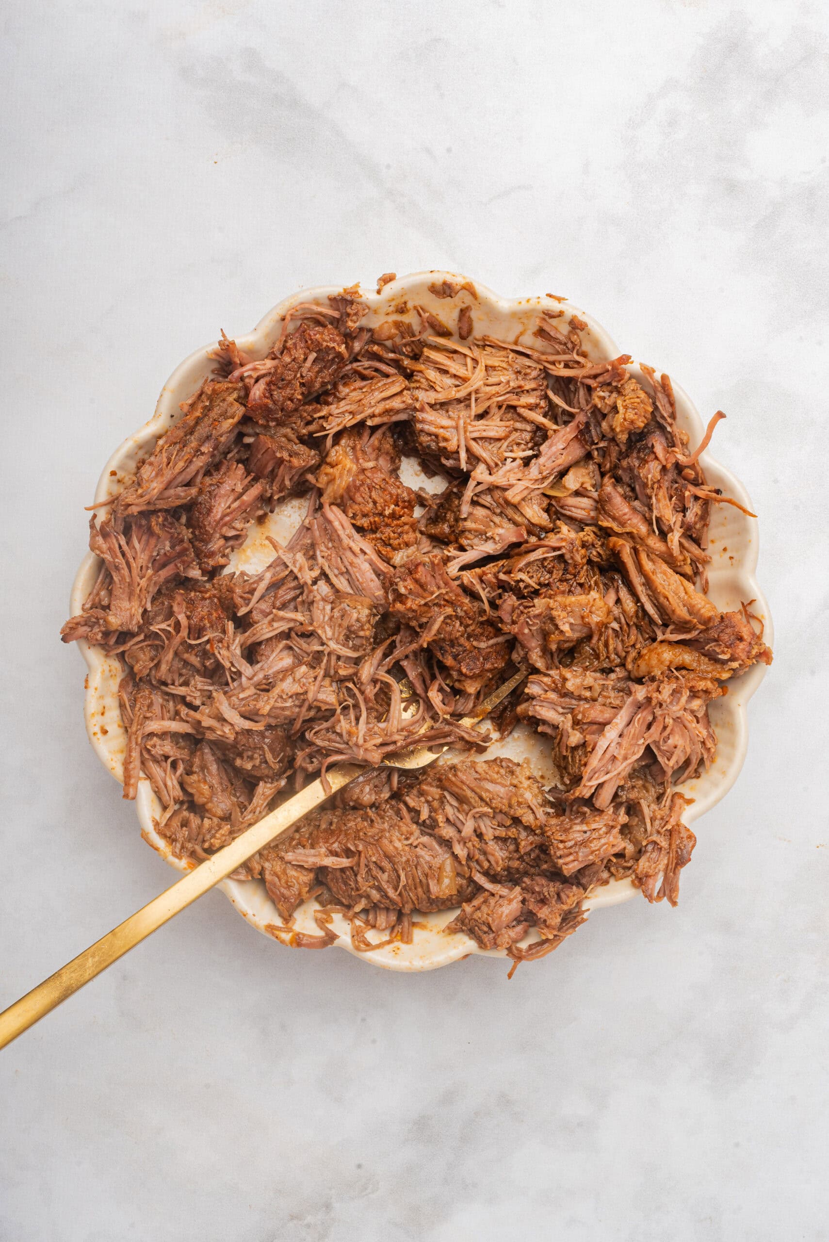 Tender shredded Crockpot BBQ pulled beef