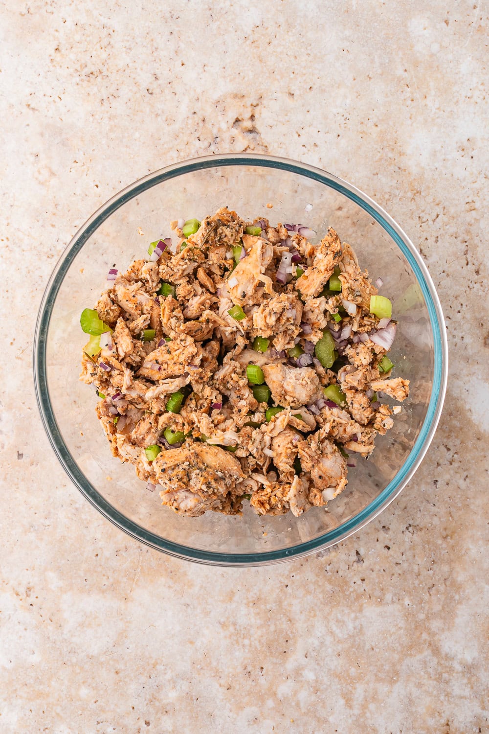 Buffalo chicken salad ingredients with celery and red onion