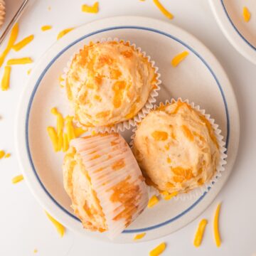 Homemade cheddar cheese muffins with golden tops