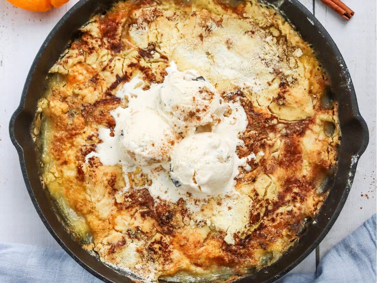Homemade skillet peach dump cake with cinnamon