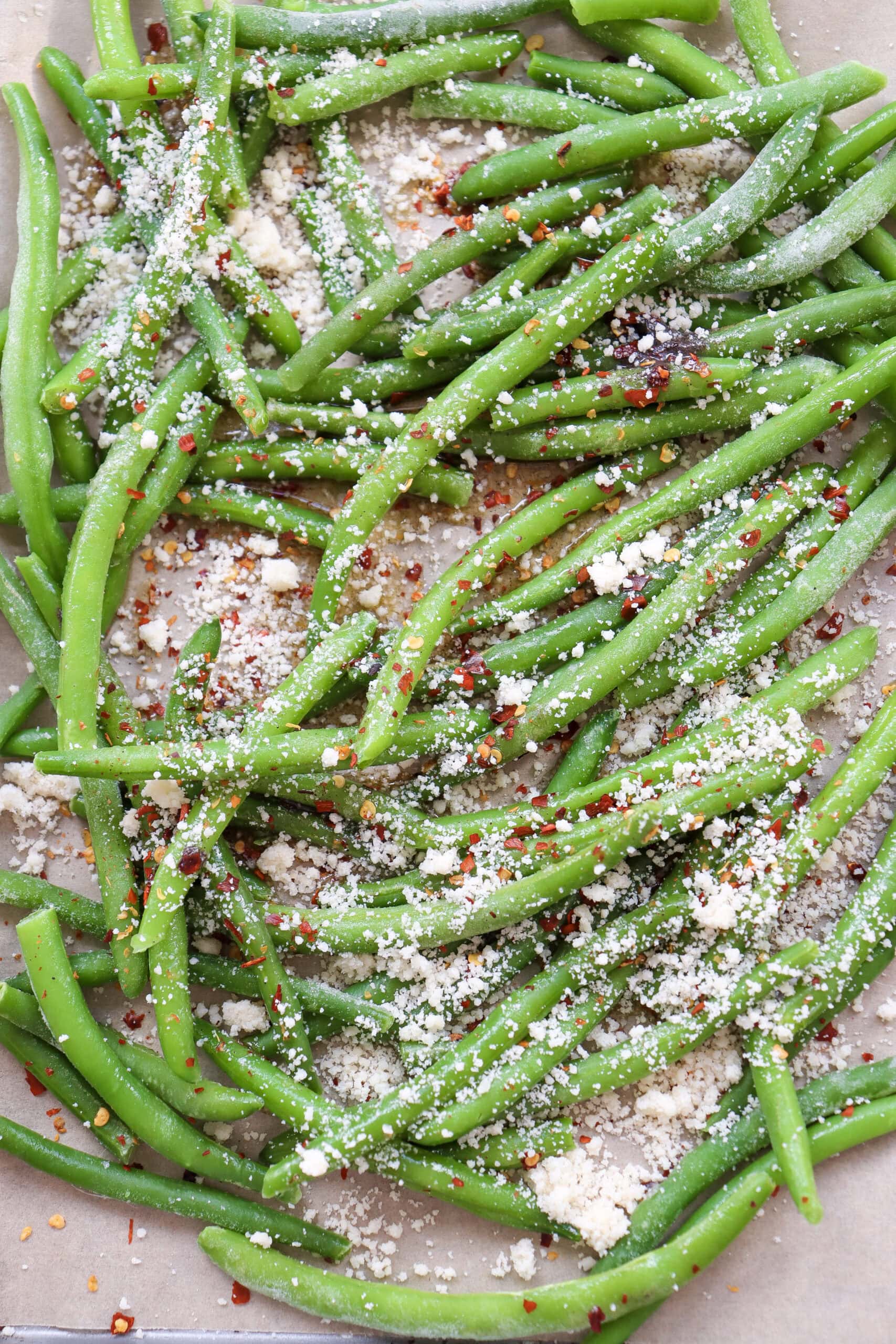 Parmesan green beans prepared for oven roasting