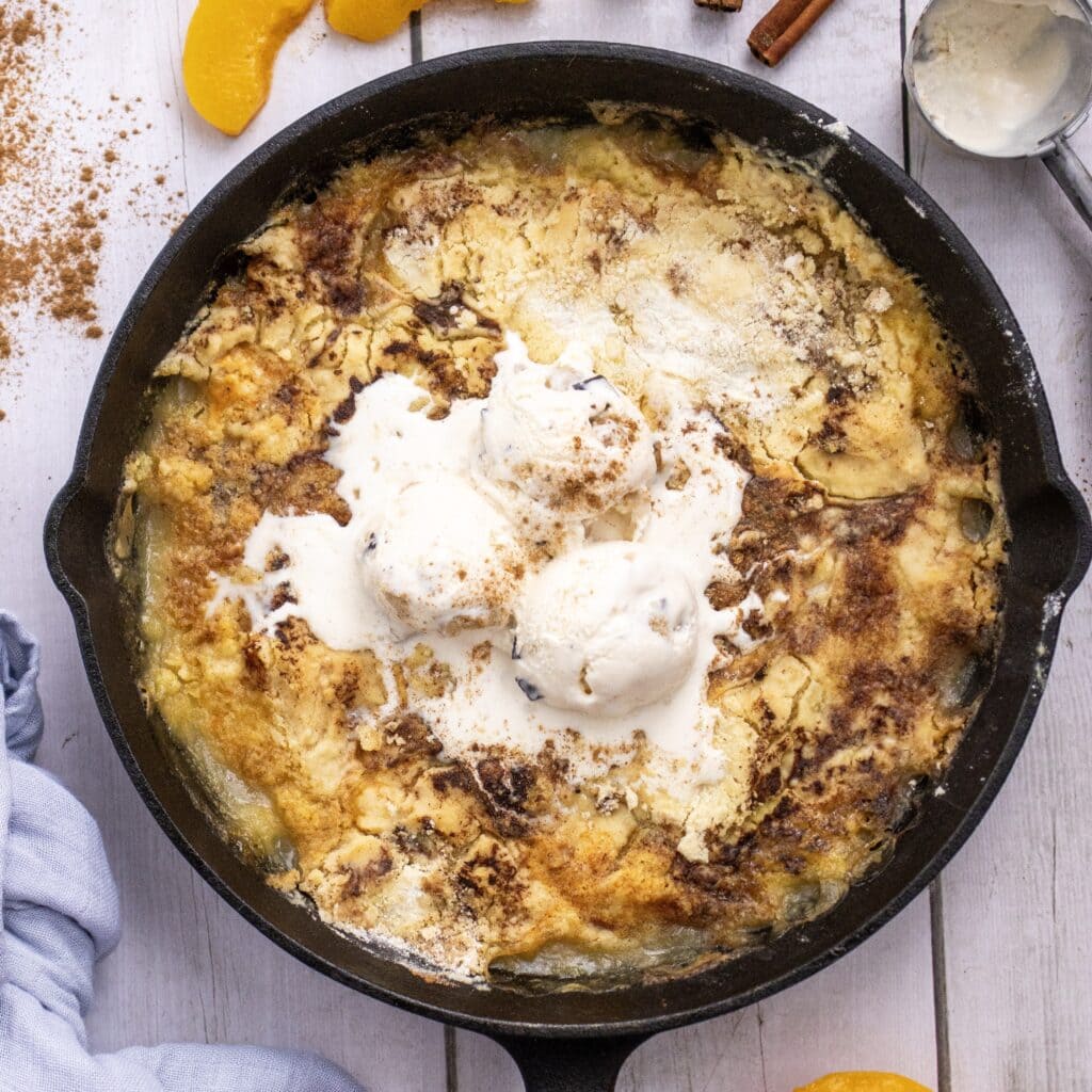Easy peach dump cake with vanilla ice cream