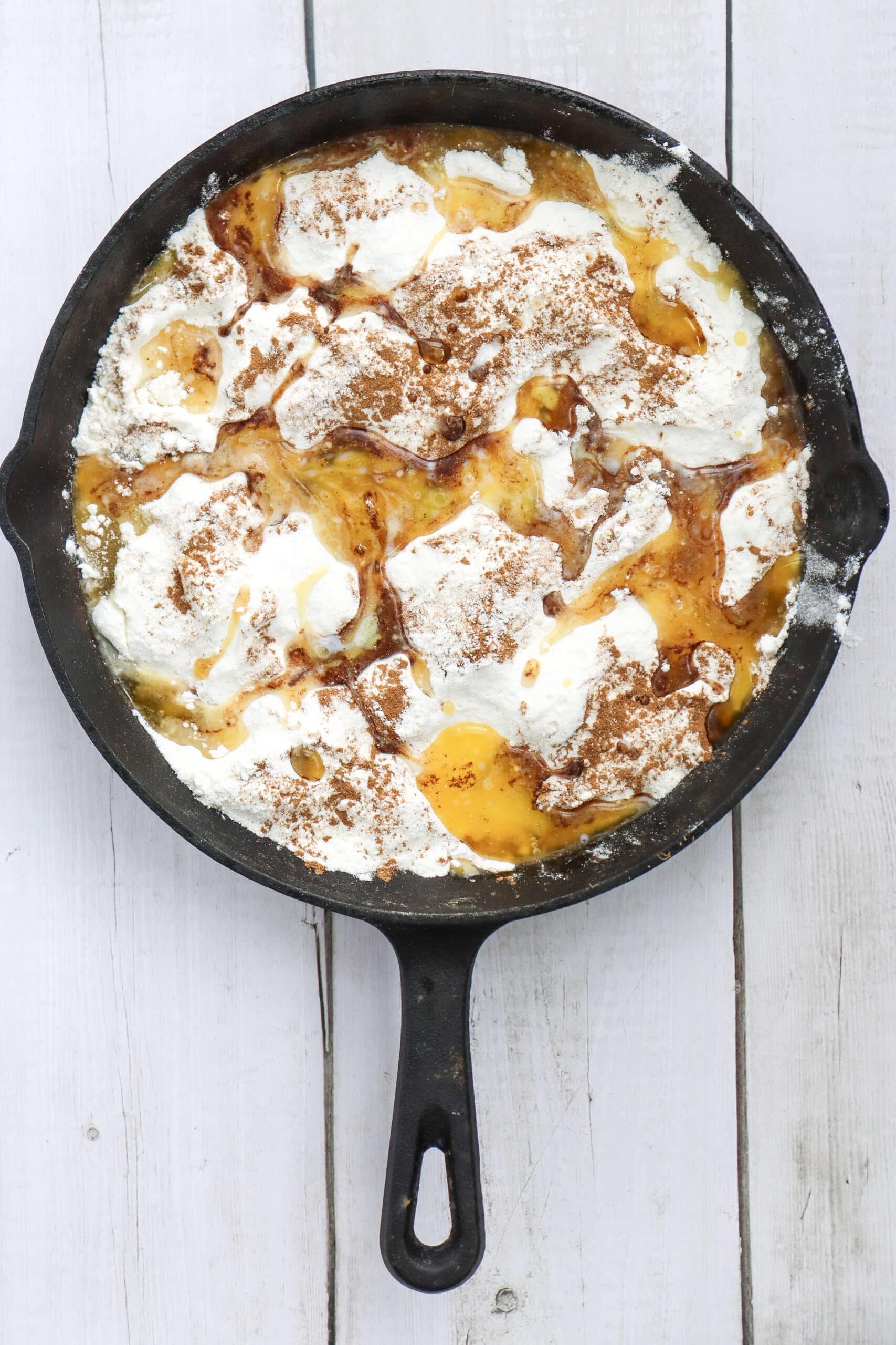 Peach dump cake with cinnamon and melted butter