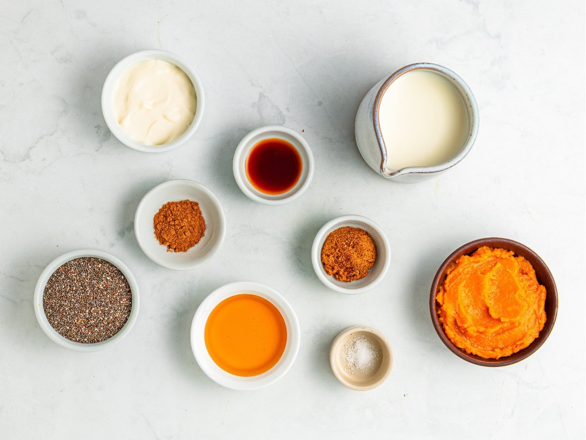 Pumpkin chia pudding ingredients with pumpkin puree and chia seeds