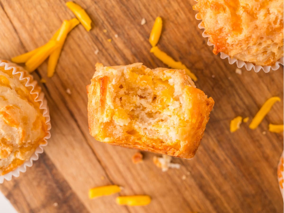 Fluffy homemade cheddar muffins with crispy edges