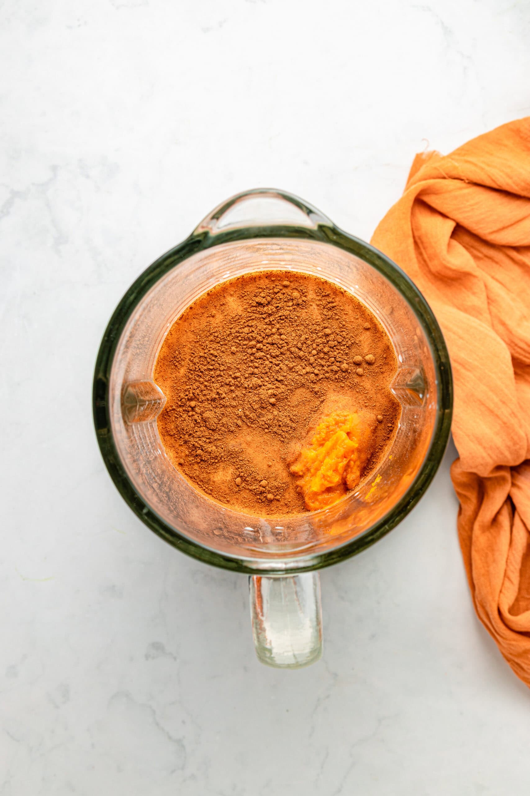 Pumpkin chia pudding ingredients with pumpkin puree and spices