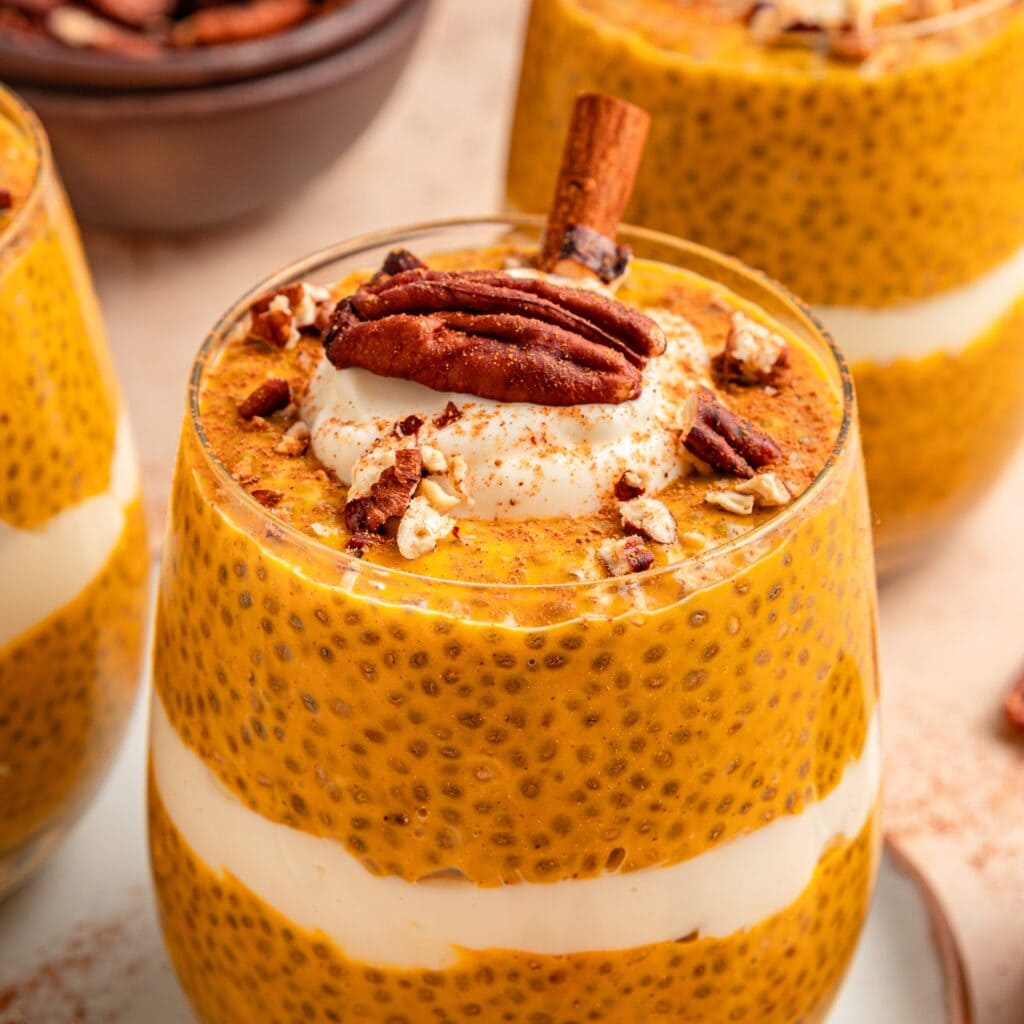 Creamy pumpkin chia pudding with pecans and cinnamon