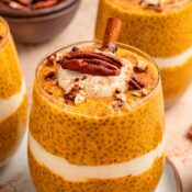 Creamy pumpkin chia pudding with pecans and cinnamon